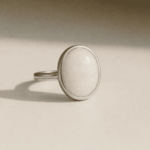 Minimum Fire White Opal Oval Sterling Silver Ring
